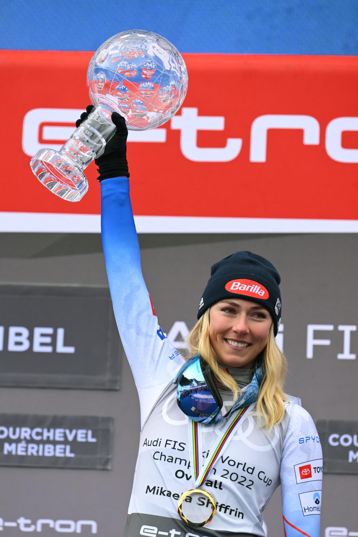 General overall FIS Alpine ski winner US ' Mikaela Shiffrin holds the crystal globe on podium during the FIS Alpine Ski World Cup finals 2021/2022 in Meribel, French Alps, on March 20, 2022. (Photo by NICOLAS TUCAT / AFP) (Photo by NICOLAS TUCAT/AFP via Getty Images)