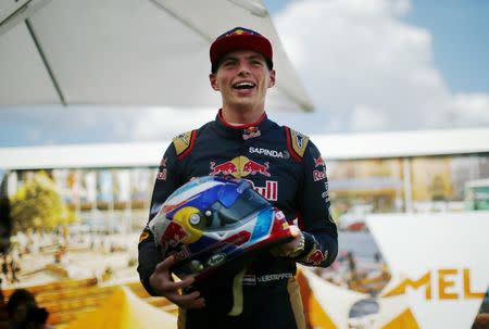 Formula One - Australia Grand Prix - Melbourne, Australia - 17/03/16 - Toro Rosso F1 driver Max Verstappen laughs posing for a drivers portrait before the Australian Formula One Grand Prix in Melbourne. REUTERS/Jason Reed