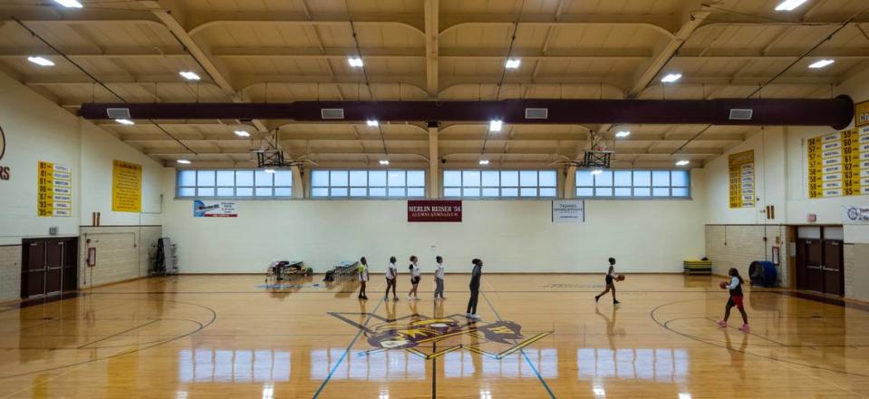 Members of the West High girls basketball team practice at the school on Tuesday. The team had to forfeit the remaining games on their schedule due to often not having enough players. Despite having no games to play, the remaining girls still come to practice every day.