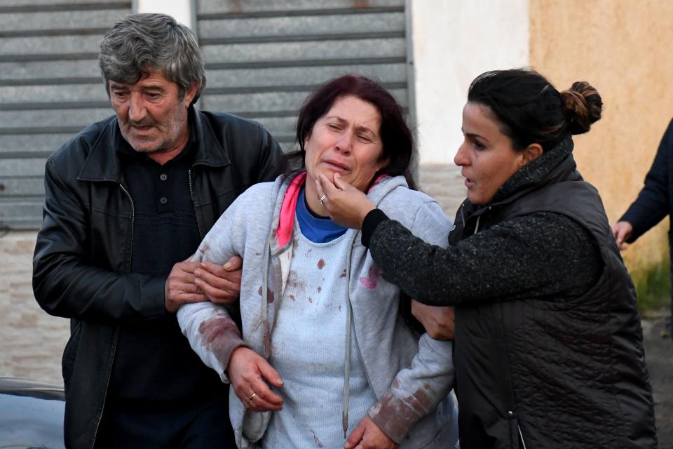 Relatives of people living at a collapsed building cry in Thumane, 34 kilometres (about 20 miles) northwest of capital Tirana, after an earthquake hit Albania, on November 26, 2019. (Photo: Gent Shkullaku/AFP via Getty Images)