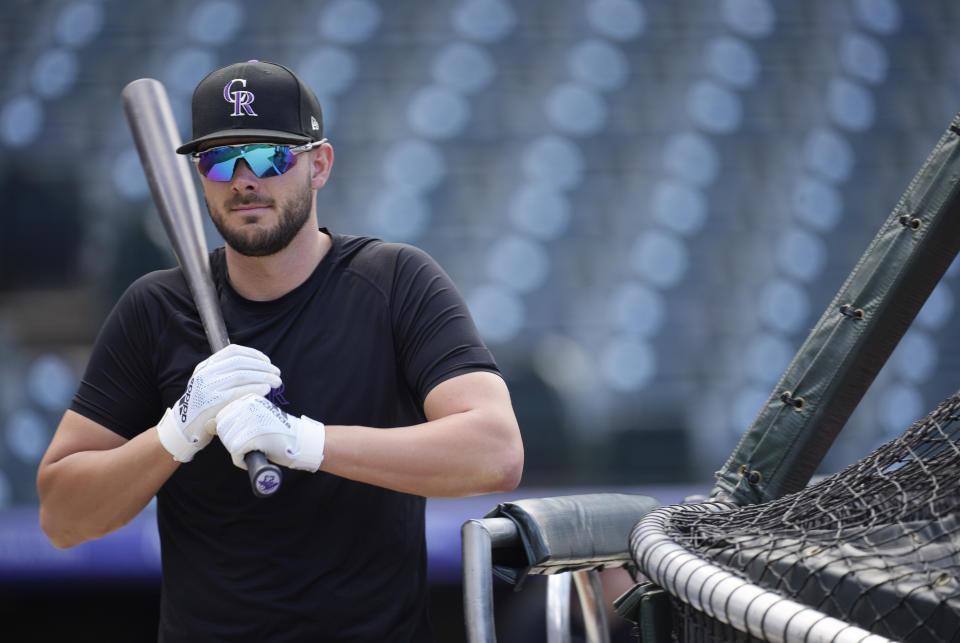 Colorado Rockies' Kris Bryant waits for his turn in the batting cage before a baseball game against the San Francisco Giants, Monday, Sept. 19, 2022, in Denver. (AP Photo/David Zalubowski)