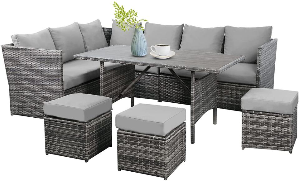 Cushioned outdoor dining table with bench