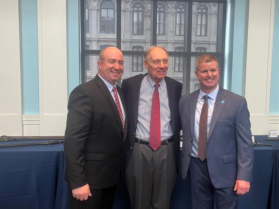 Upper Merion detectives Andrew Rathfon, far left, and Brendan Dougherty, far right, stand with mentor, retired FBI agent Dave Richter, at a March 13, 2023 ceremony repatriating 50 historical artifacts to 16 museums in the Northeast United States. Rathfon and Dougherty's work on the cold case museum thefts led to  the return of the items..