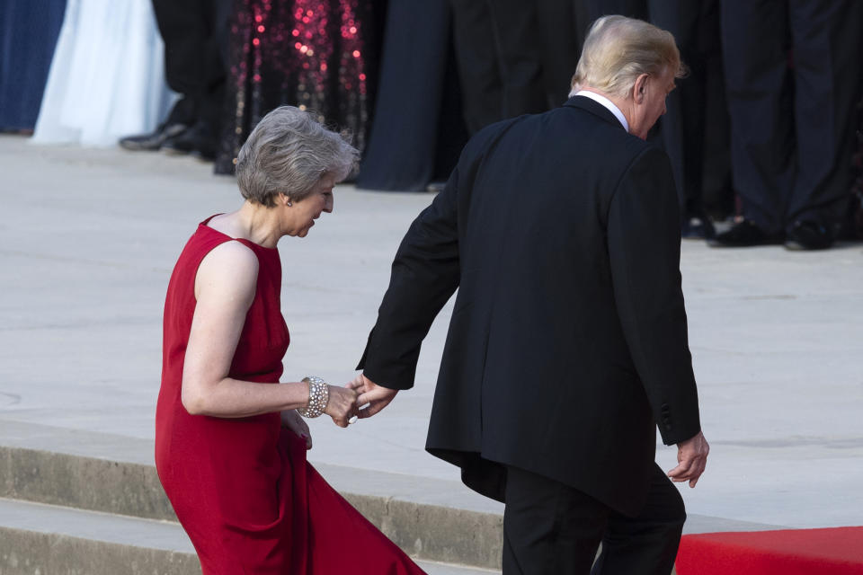 President Trump led British Prime Minister Theresa May up the stairs at Blenheim Palace in Woodstock, England. (Photo: Getty Images)