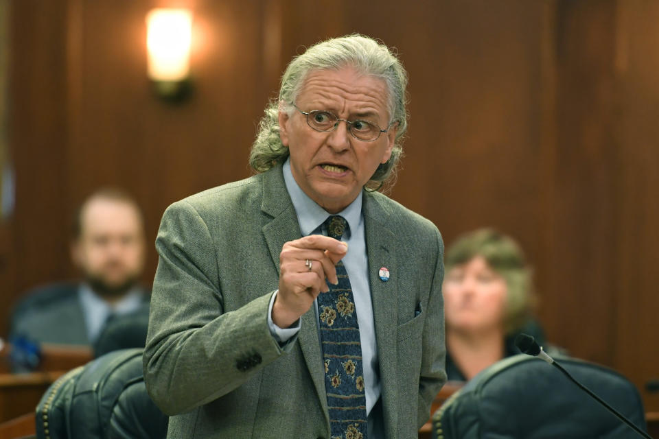 State Sen. Tom Begich, an Anchorage Democrat, speaks in favor of lawmakers overriding Gov. Mike Dunleavy's budget vetoes Wednesday, July 10, 2019, Juneau, Alaska. Nearly a third of lawmakers were absent from the session at the Capitol, opting to meet in Wasilla instead, leaving only 38 members meeting in Juneau. It would take 45 votes to override the vetoes. ( Michael Penn/ Juneau Empire via AP)