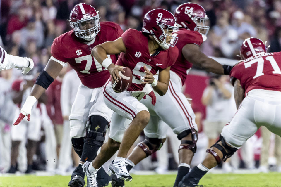 Alabama quarterback Bryce Young (9) rolls out against Mississippi State during the second half of an NCAA college football game Saturday, Oct. 22, 2022, in Tuscaloosa, Ala. (AP Photo/Vasha Hunt)