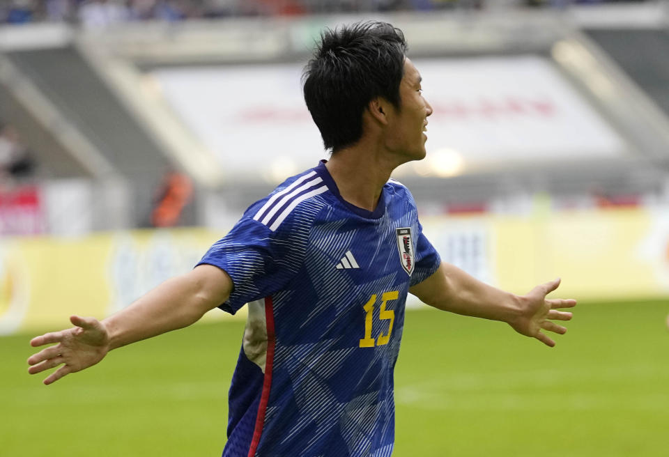 Japan's Daichi Kamada celebrates after scoring during the international friendly soccer match between USA and Japan as part of the Kirin Challenge Cup in Duesseldorf, Germany, Friday, Sept. 23, 2022. (AP Photo/Martin Meissner)