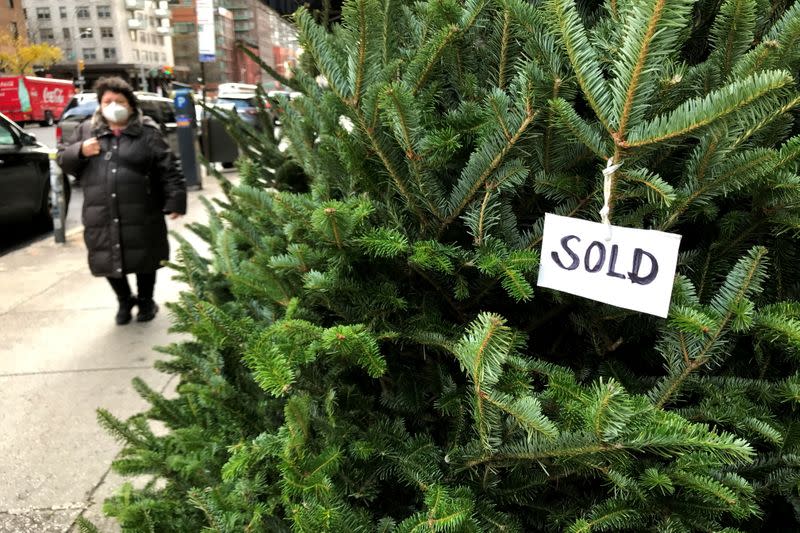 Christmas tree sits outside Manhattan bodega