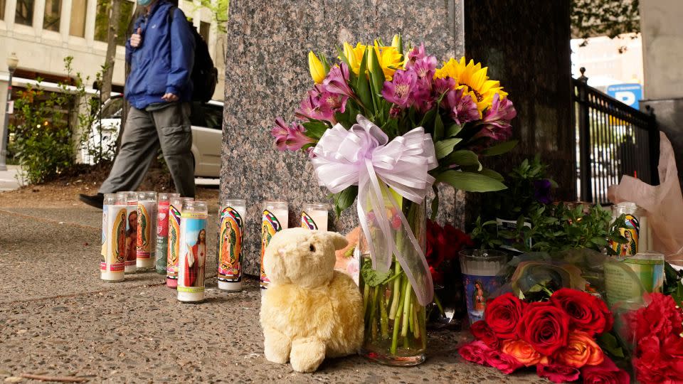 A memorial grew near the site of the late-night shooting in April 2022. - Rich Pedroncelli/AP