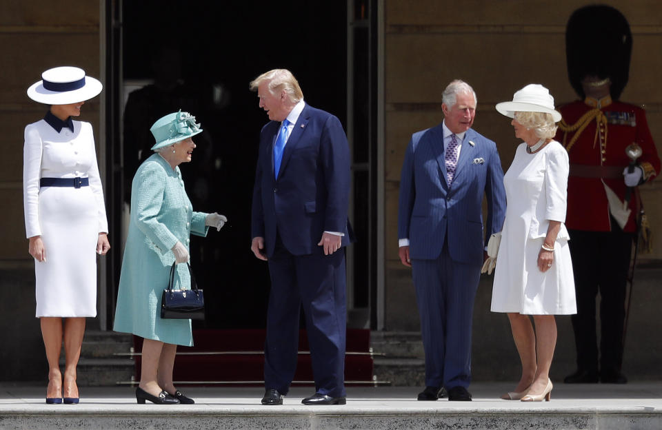 Britain's Queen Elizabeth II greets President Donald Trump, center, and first lady Melania Trump, left, with Britain's Prince Charles and Camilla, Duchess of Cornwall during a ceremonial welcome in the garden of Buckingham Palace in London, Monday, June 3, 2019 on the opening day of a three day state visit to Britain. (Photo: Frank Augstein/AP)