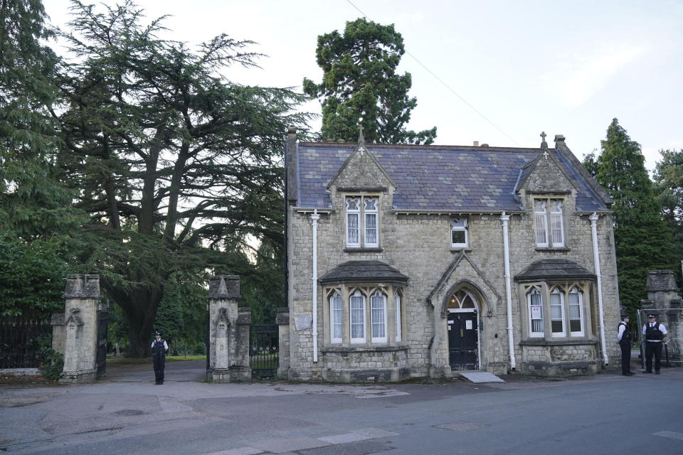 A view of the entrance to Lavender cemetery in Enfield, north London where triple murder suspect Kyle Clifford, 26, was found by officers on Wednesday afternoon, July 10, 2024. British police said they found Wednesday the man suspected of killing the wife and two daughters of a well-known BBC radio commentator near London in a brutal crossbow attack. (Jonathan Brady/PA via AP)