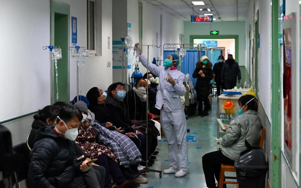 Medics treat Covid patients in Chengdu - Photo by Shutterstock
