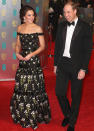 It's nearly BAFTA time again so get ready for all those show-stopping gowns, dazzling jewels and high heel heaven. The red carpet is all about A-listers' outfit choices, but don't forget some of our favourite royals often attend too, giving us a double hit of glamour. The Duchess of Cambridge has graced the BAFTAs twice over the years, in 2017 and 2018, as well as popping into the BAFTA Brits to Watch event way back in 2011. All of her outfits have been stunning, so as 2019 ceremony draws near, we decided to relive Kate's past BAFTA looks – the designer dresses, jewellery, shoes and bags. Enjoy! The Duchess wore this breath-taking black patterned off-the-shoulder gown by Alexander McQueen to the 2017 BAFTAs. Didn't she look amazing? The dress featured a Bardot neckline, bodice and full-length skirt with stylish ribbon detailing.