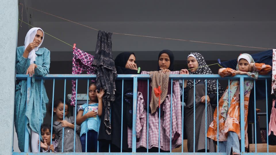 Palestinians who have fled their homes due to Israeli strikes take shelter in a UN-run school in Khan Younis in southern Gaza on October 27, 2023. - Mohammed Salem/Reuters