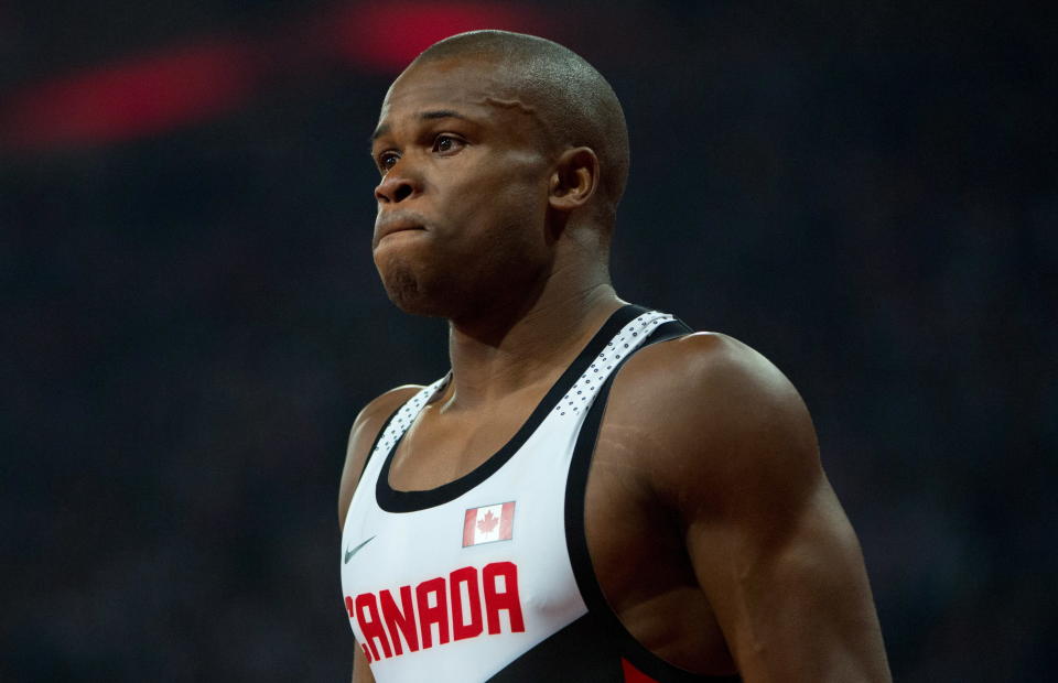 Canada's Oluseyi Smith reacts to being disqualified in the 4x100-metre relay at the 2012 Summer Olympics in London on Saturday, August 11, 2012. THE CANADIAN PRESS/Sean Kilpatrick