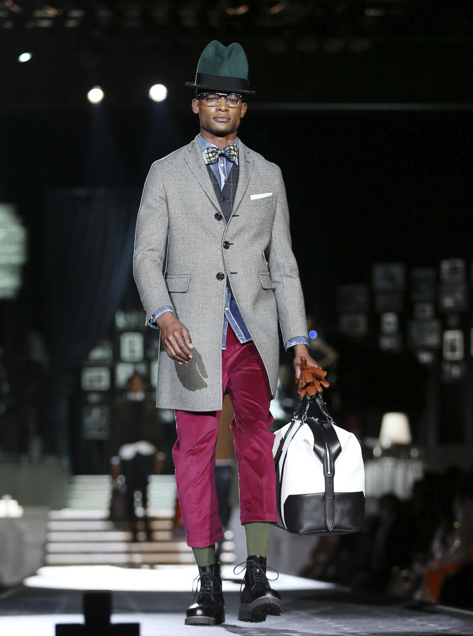 A model wears a creation for DSquared2 men's Fall-Winter 2013-14 collection, part of the Milan Fashion Week, unveiled in Milan, Italy, Tuesday, Jan. 15, 2013. (AP Photo/Antonio Calanni)