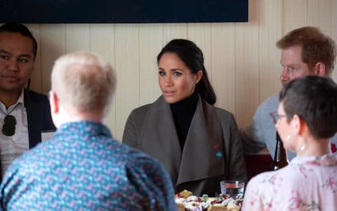 The Duchess of Sussex talks people from a number of mental health projects - Credit: Ian Vogler