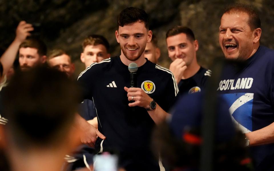 Andy Robertson of Scotland (center) addresses a reception at the Bayernhalle in Garmisch-Partenkirchen, Germany.  Scotland has its team base in the area for their UEFA Euro 2024 campaign