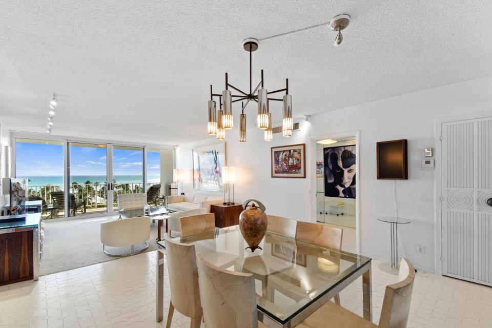 Sliding glass doors at the far end of the great room capture wide views of the Atlantic.