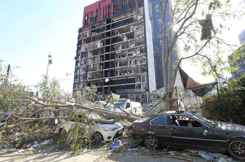 A view shows a damaged building and vehicles following Tuesday's blast in Beirut's port area, Lebanon