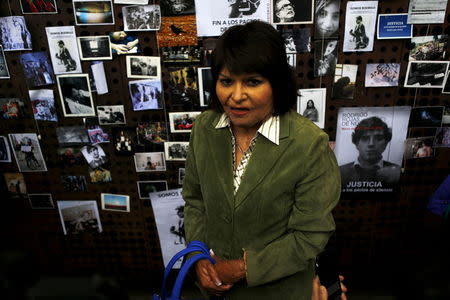 Carmen Gloria Quintana, who suffered serious injuries when she was set on fire during a Santiago labor strike in 1986 with U.S. citizen Rodrigo Rojas (pictured R), a 19-year-old U.S. student, who died, attends a rally to claim justice in Santiago, Chile, July 28, 2015. REUTERS/Ivan Alvarado