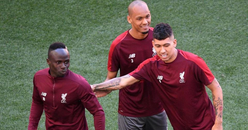 Sadio Mane and Liverpool stars Fabinho and Roberto Firmino Credit: Alamy