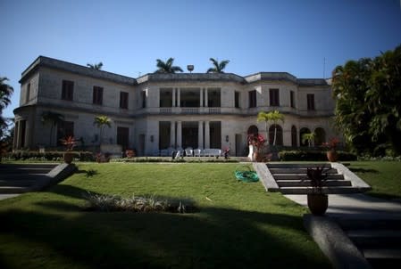 A view from the gardens shows the terrace of the U.S. ambassadorial residence, where U.S. President Barack Obama, his wife and first lady Michelle Obama, their two daughters Malia and Sasha and the first lady's mother Marian Robinson are scheduled to stay during the first visit by a U.S. president to Cuba in 88 years, in Havana, March 14, 2016. REUTERS/Alexandre Meneghini