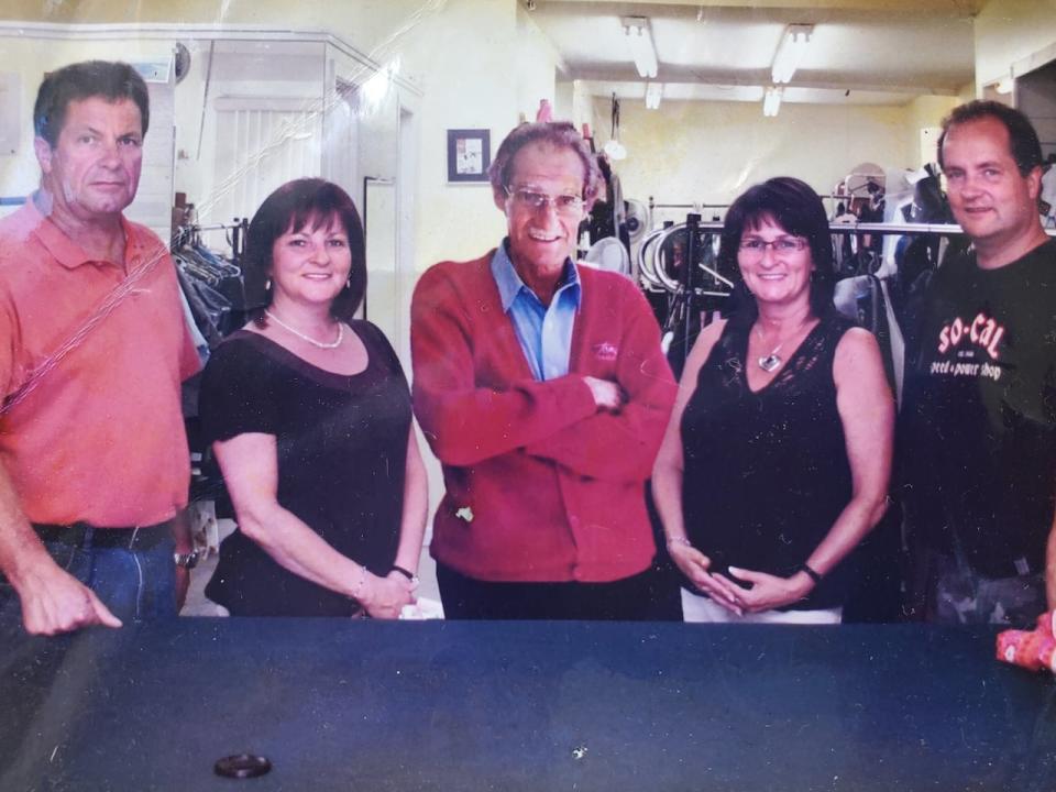 Some of the Silver family: Tony Jr., Theresa, Tony Sr., Rose and Mike Silver at Tony's Tailor Shop circa 2010. 
