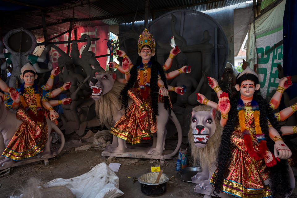 LALITPUR, NEPAL - 2020/10/14: A view of the statues of Hindu goddess Durga prepared for the Dashain festival. Dashain is the most auspicious festival in Nepal which is celebrated for 10 days by Nepalese Hindu people by offering devotion towards the Goddess Durga, marking the triumph of good over evil. Clay idols are transported to different places of Kathmandu valley but according to the artist, due to the covid-19 pandemic less numbers of clay statues are ordered. (Photo by Bivas Shrestha/SOPA Images/LightRocket via Getty Images)