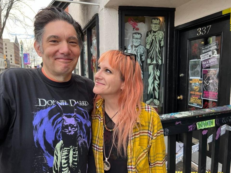 Chris and Julia Bentley stand outside their Heart Shaped Box Whiskey Bar in downtown Canton near the former Buzzbin music club. The couple closed Buzzbin last summer and relocated it in Kenmore in Akron.