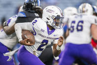 James Madison quarterback Jordan McCloud (2) runs for the first down in the second half of an NCAA college football game against Georgia State, Saturday, Nov. 4 2023, in Atlanta. (AP Photo/Hakim Wright Sr.)