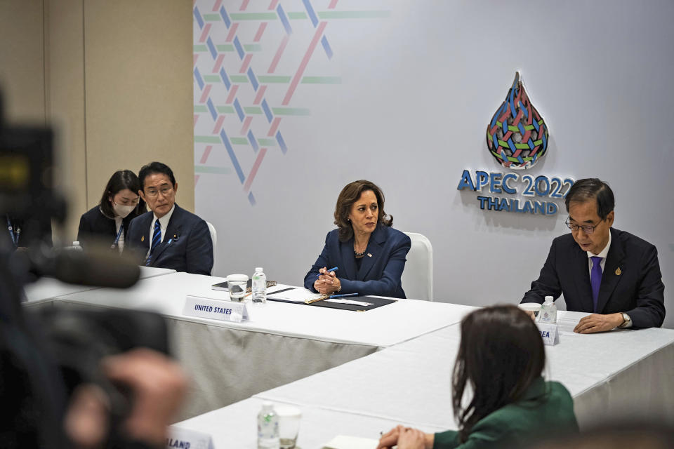 U.S. Vice President Kamala Harris, middle, holds an emergency meeting with Japanese Prime Minister Fumio Kishida, left, South Korean Prime Minister Han Duck-soo, right, Australian Prime Minister Anthony Albanese, New Zealand's Prime Minister Jacinda Ardern, and Canadian Prime Minister Justin Trudeau to discuss North Korea's recent ballistic missile launch during the Asia-Pacific Economic Cooperation (APEC) summit, Friday, Nov. 18, 2022, in Bangkok, Thailand. (Haiyun Jiang/Pool Photo via AP)