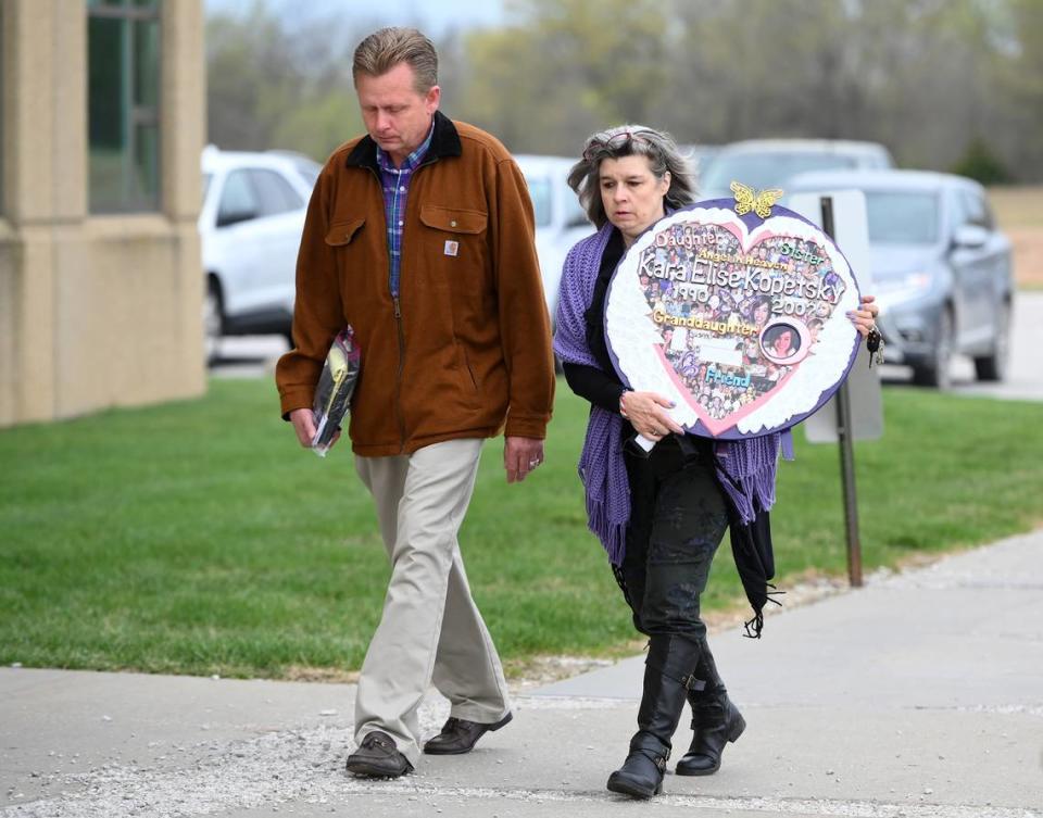 Kara Kopetsky’s mother, Rhonda Beckford and step-father Jim Beckford, arrive at the Cass County Justice Center Friday, April 16, 2021, for the sentencing of Kylr Yust. Yust was found guilty by a jury Thursday of killing Kopetsky and Jessica Runions.