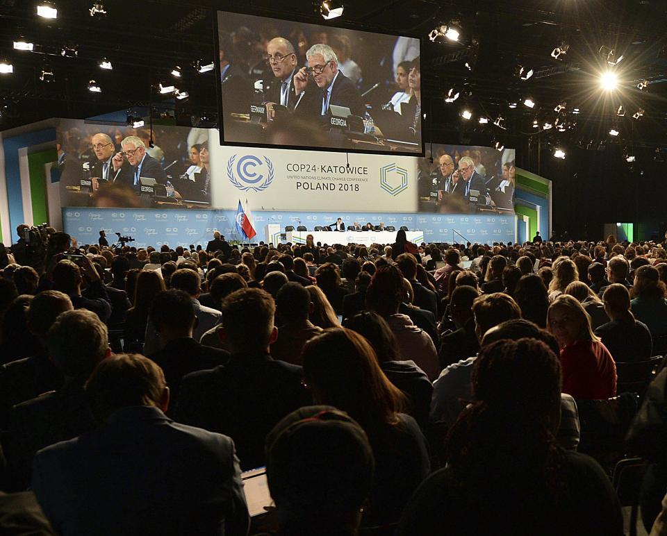 Participants attend the COP24 U.N. Climate Change Conference 2018 in Katowice, Poland, Thursday, Dec. 13, 2018. (AP Photo/Czarek Sokolowski)