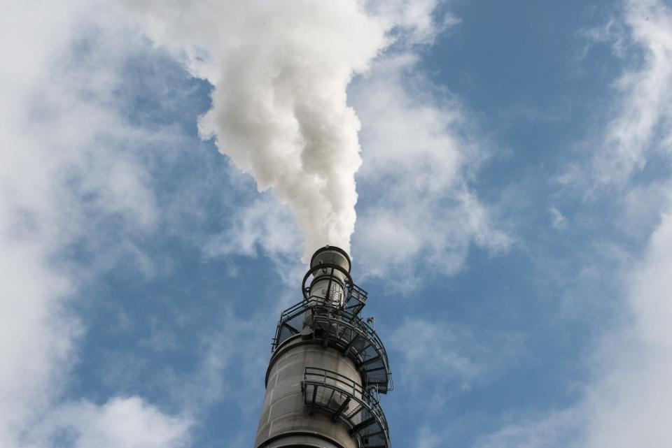 Smoke billows from one of many chemical plants in the area October 11, 2013.