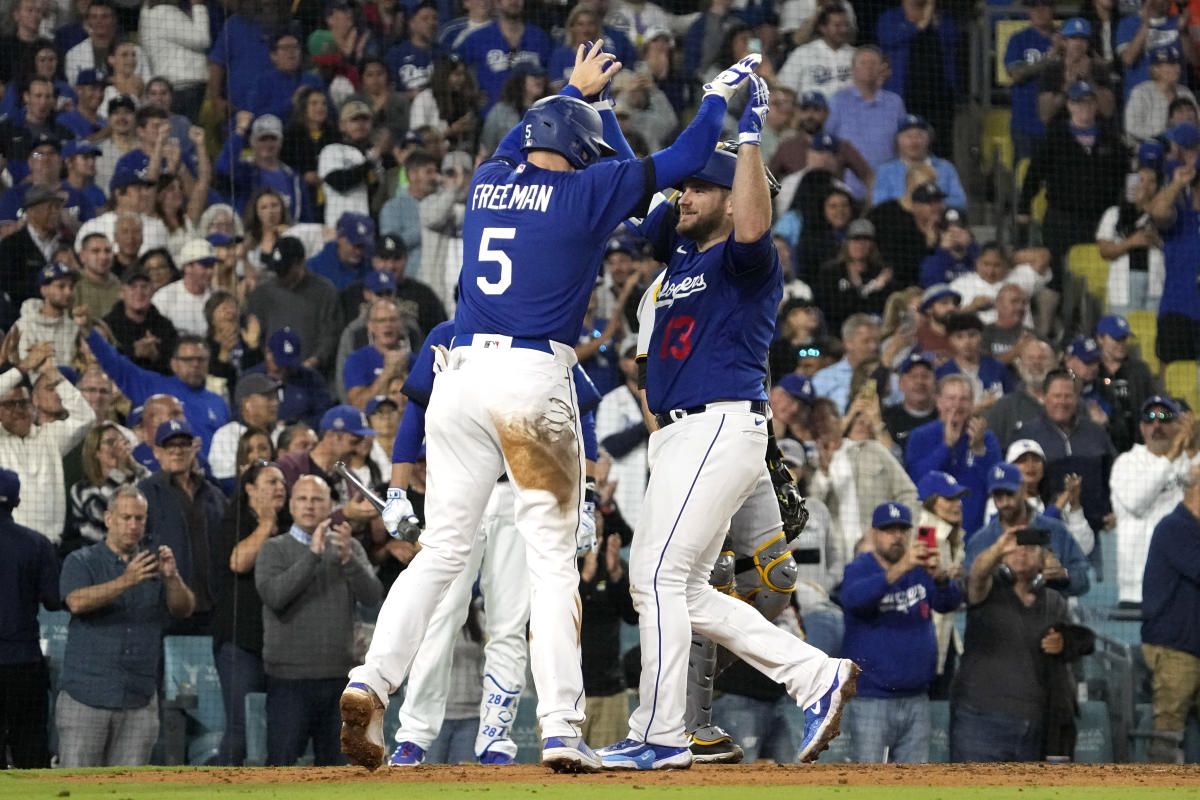 Dodgers beat the Pirates 5-2 to pull within a half-game of NL West