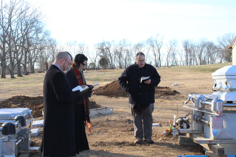 Local clergy join for a funeral service on Jan. 26, 2022 to honor several individuals being buried as part of the Metro Nashville Social Services indigent burial program. The initiative that recruits clergy to pray for those being buried is Call the Name.