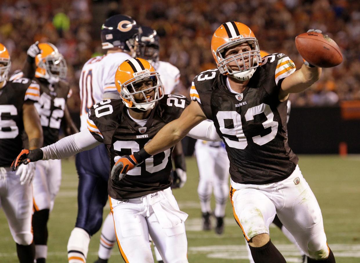 Jason Trusnik, right, and Mike Adams playing for the Cleveland Browns on Thursday, Sept. 2, 2010, in Cleveland. (AP Photo/Amy Sancetta)