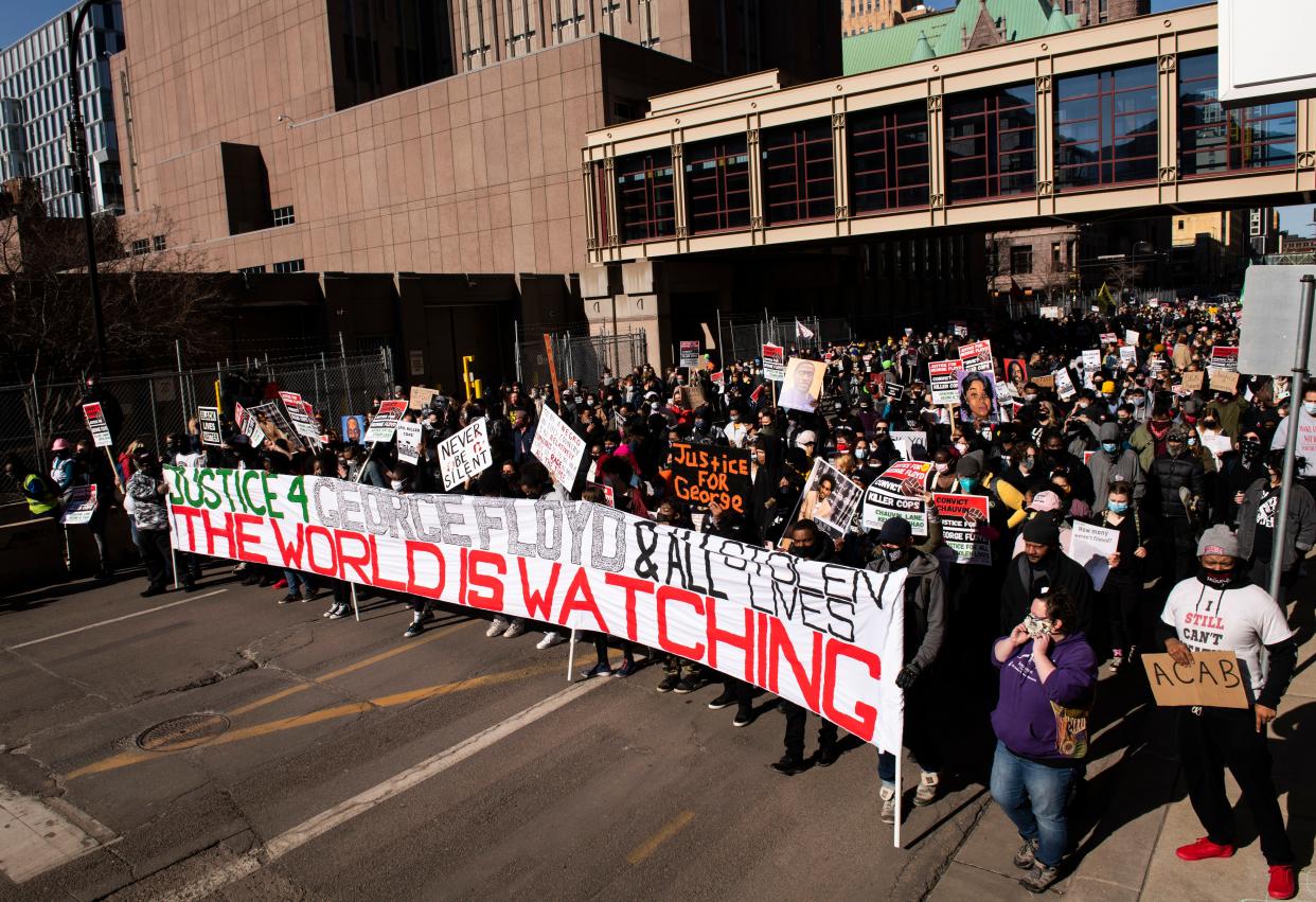 People march during a demonstration in honor of George Floyd on March 8, 2021, in Minneapolis, Minnesota.