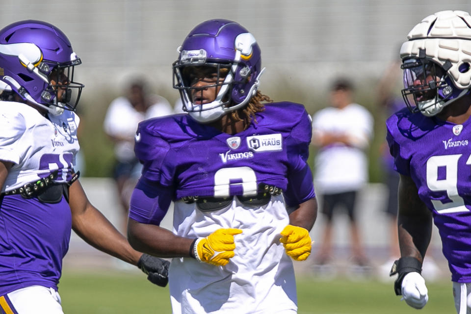 FILE - Minnesota Vikings safety Lewis Cine (6) runs drills during NFL football training camp in Eagan, Minn., Thursday, Aug. 11, 2022. First-round draft pick Lewis Cine is expected to anchor Minnesota's secondary for many years to come, but rookies have to earn their way into the lineup. (AP Photo/Andy Clayton-King, File)