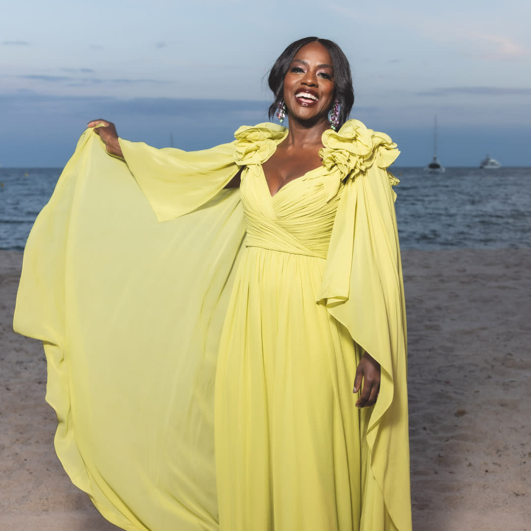  Viola Davis at the Cannes Film festival wearing a green cape dress. 