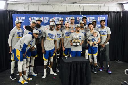 May 20, 2019; Portland, OR, USA; The Golden State Warriors get together for a team photo after defeating the Portland Trail Blazers in game four of the Western conference finals of the 2019 NBA Playoffs at Moda Center. The Warriors won 119-117 in overtime. Mandatory Credit: Troy Wayrynen-USA TODAY Sports