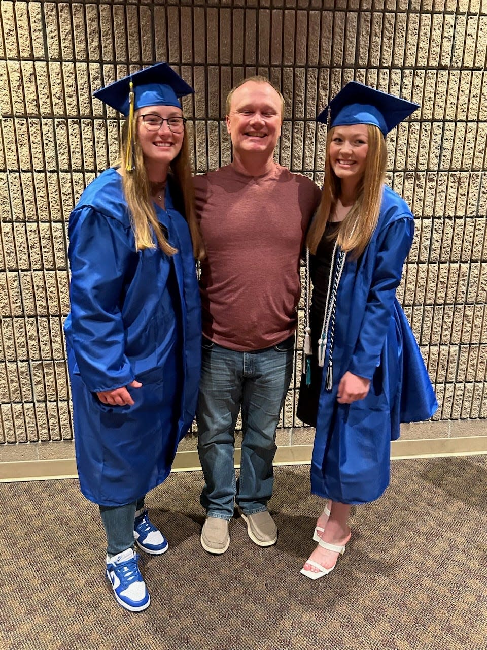 Jim Gastineau, middle, will witness twin daughters Olivia and Lexie Gastineau graduate on Sunday at Ava High School. He missed their birth because his military unit was stationed in Iraq in 2005.