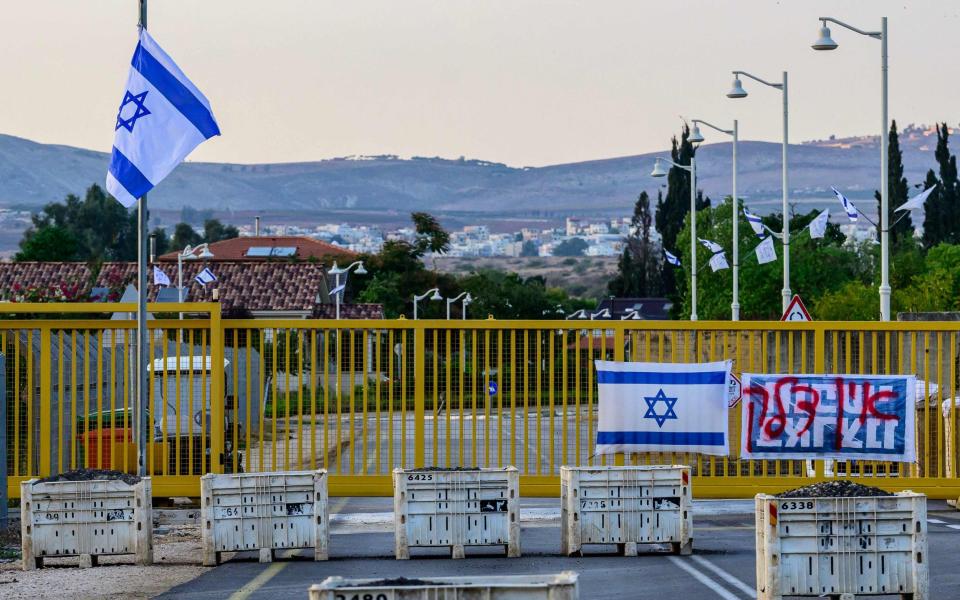 The evacuated Kibbutz Dan in northern Israel, showing a hill in Lebanon in the backgroun