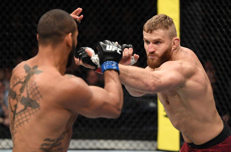 PRAGUE, CZECH REPUBLIC - FEBRUARY 23:  (R-L) Jan Blachowicz of Poland punches Thiago Santos of Brazil in their light heavyweight bout during the UFC Fight Night event at O2 Arena on February 23, 2019 in the Prague, Czech Republic. (Photo by Jeff Bottari/Zuffa LLC/Zuffa LLC via Getty Images)