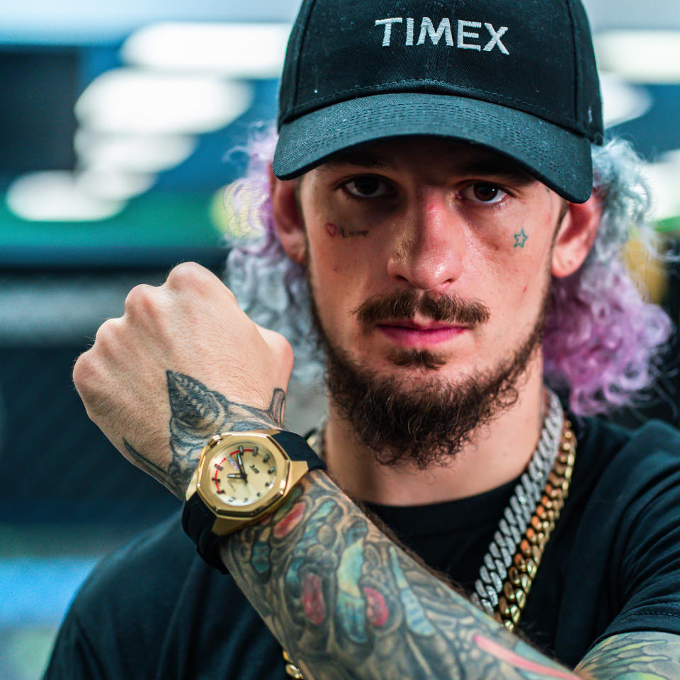 “Suga” Sean O’Malley wearing the Timex x UFC collection.