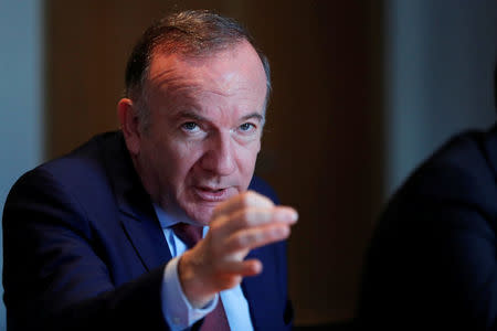 French employers body MEDEF union leader Pierre Gattaz gestures as he attends an interview with Reuters in Paris, France, March 30, 2017. REUTERS/Gonzalo Fuentes