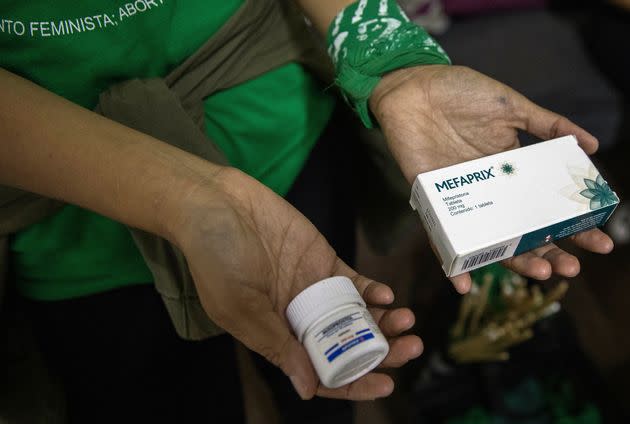 Crystal Perez Lira shows medicine used for an abortion protocol during an interview at the reproductive rights organization 