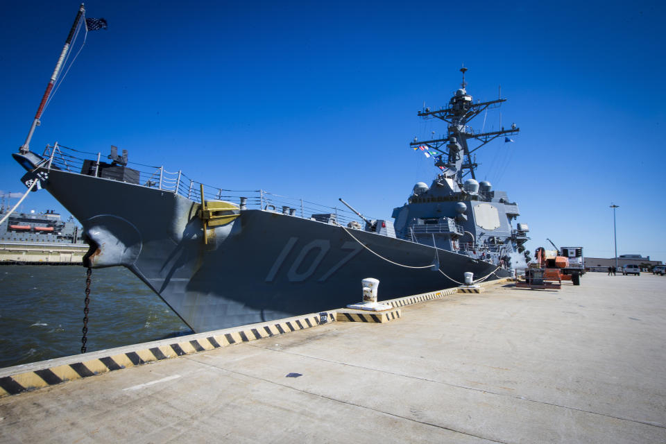 The Arleigh Burke-class destroyer USS Gravely (DDG-107) is docked at its home port Norfolk Naval Station in Norfolk, Va. on Tuesday, March 14, 2023. The U.S. Navy is planning to make chaplains regular members of the crew on ships with more than 300 sailors, instead of only the largest carriers as in the past. (AP Photo/John C. Clark)