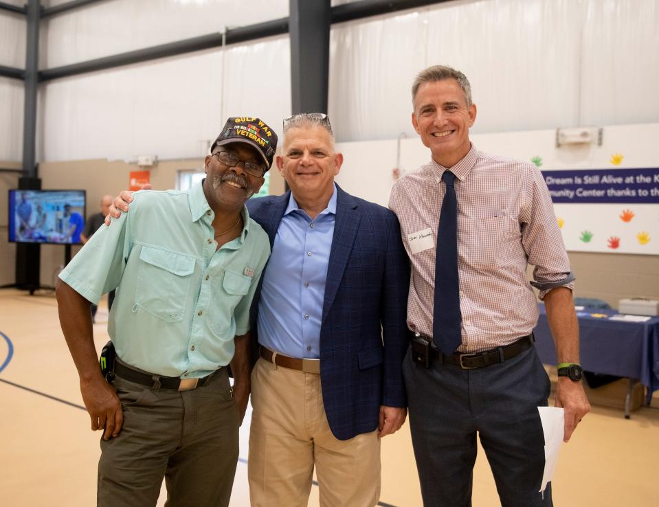 Former King Kennedy Community Center board member Perry Taylor, Family and Community Services Executive Director Mark Frisone and KKCC Advisory Board President John Kennedy were among those at the open house Thursday for a new multi-use recreational facility.